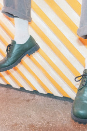 Derbies chaussures unisexes en cuir véritable vert sapin, gros plan semelle et rebord