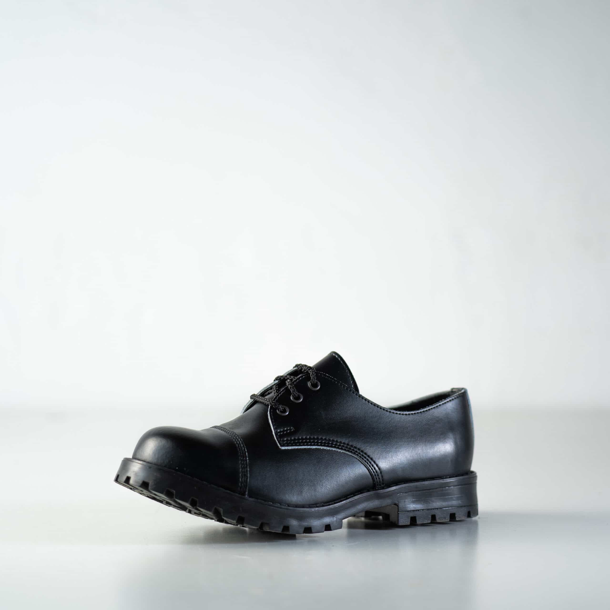Bottines militaires en cuir noir fait main, détail des coutures