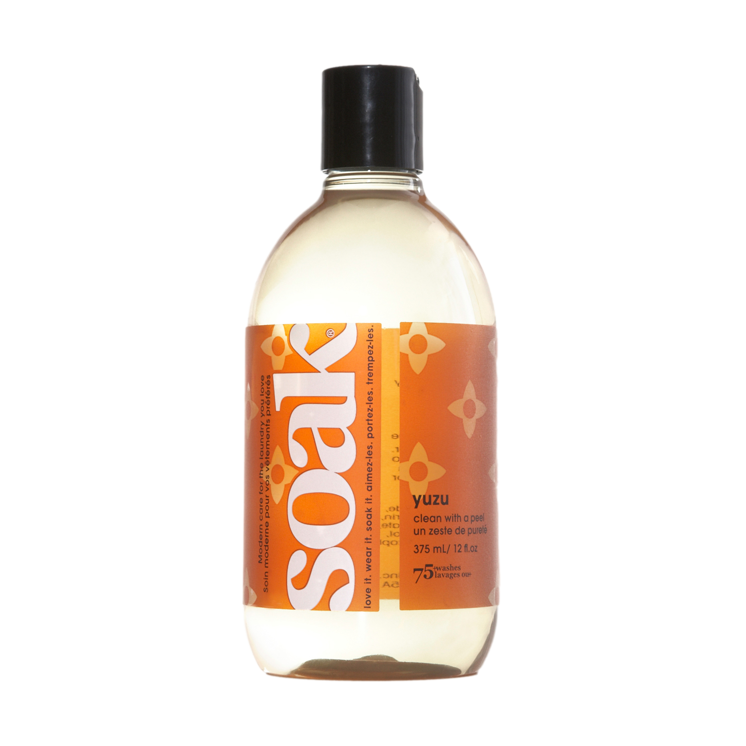 Lessive Soak Yuzu 375 ml parfum agrumes, flacon sur fond noir