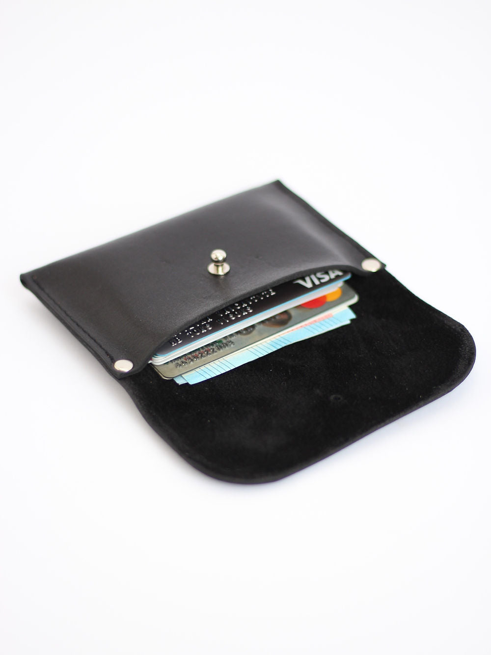 Portefeuille WEEKEND TOKS VISOKS en cuir noir, design épuré