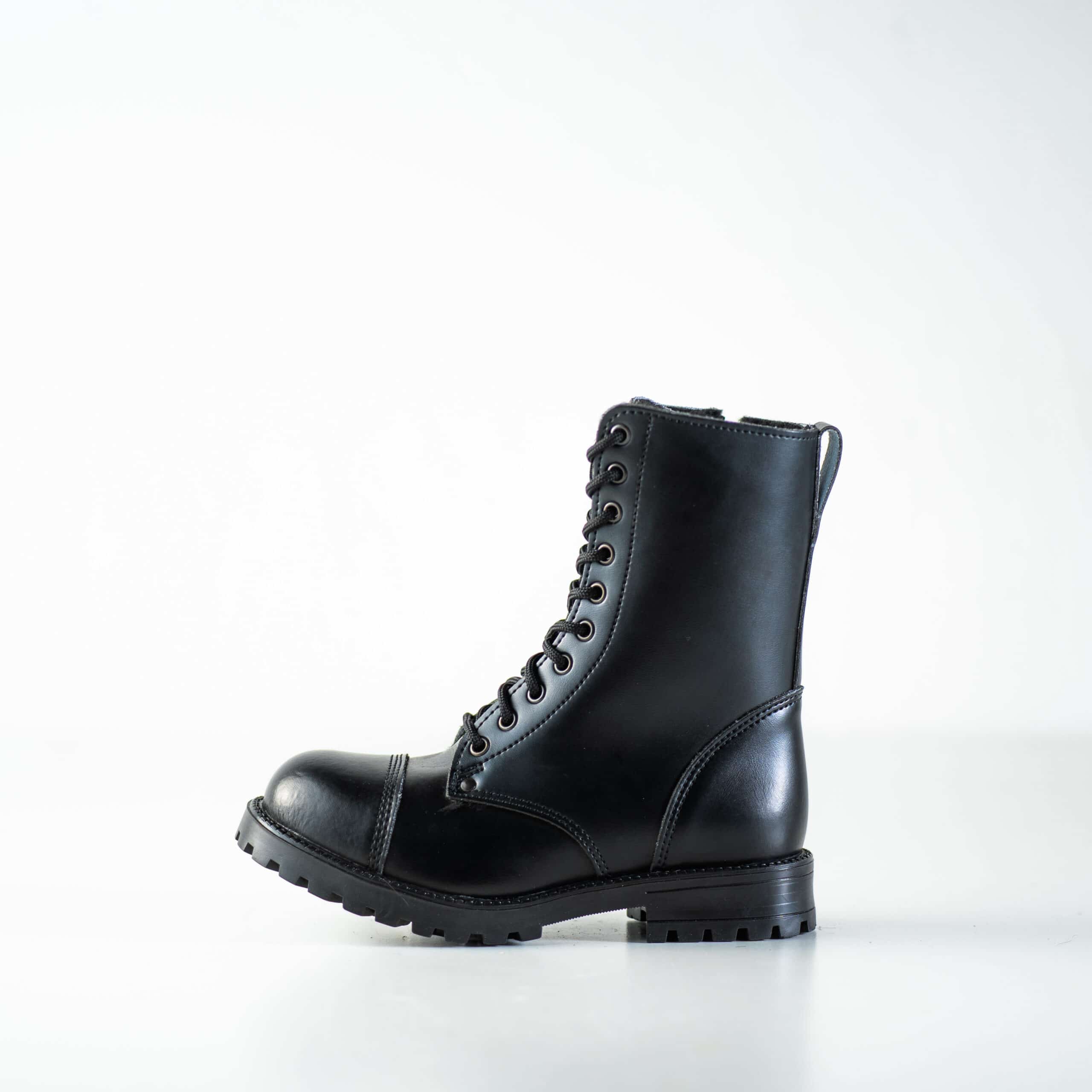 Bottines d'hiver en cuir noir à semelle crantée, vue arrière de profil