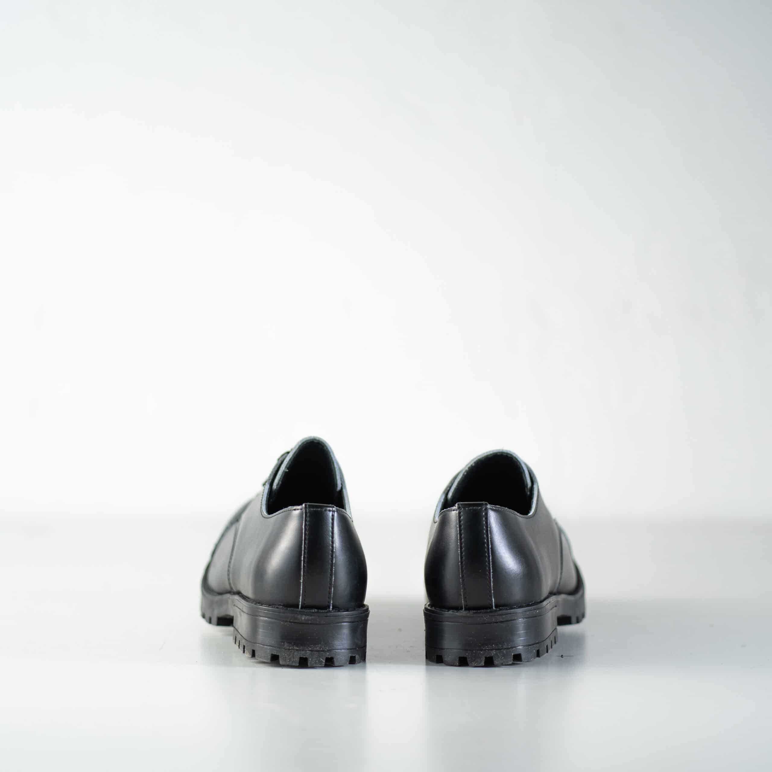Bottines militaires en cuir noir fait main, vue trois quarts