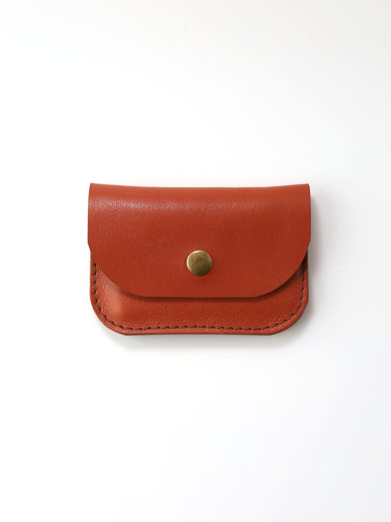 Portefeuille WEEKEND TOKS VISOKS en cuir rouge terracotta, détail courroie