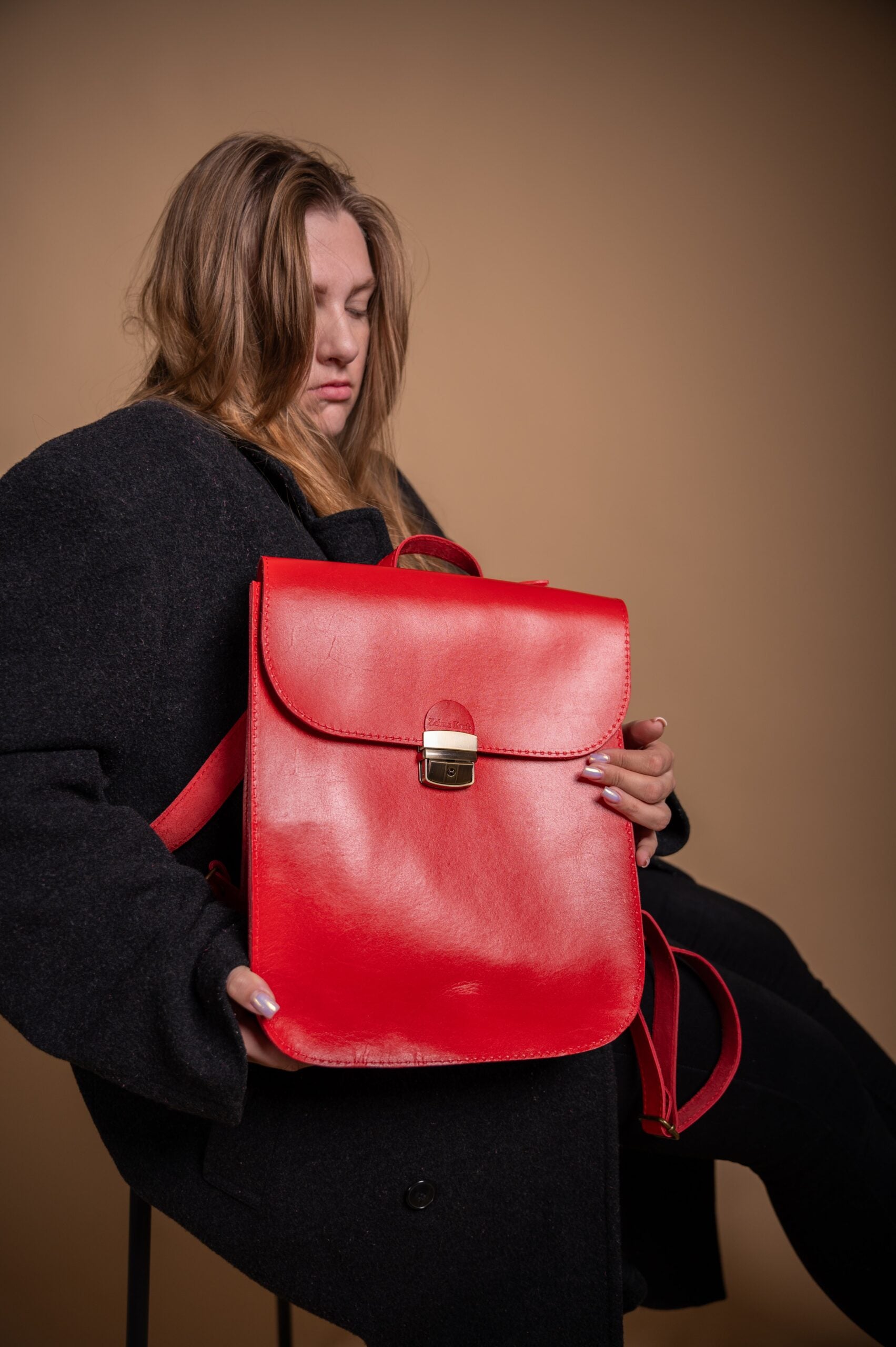 Sac à dos selle en cuir naturel rouge, vue produit